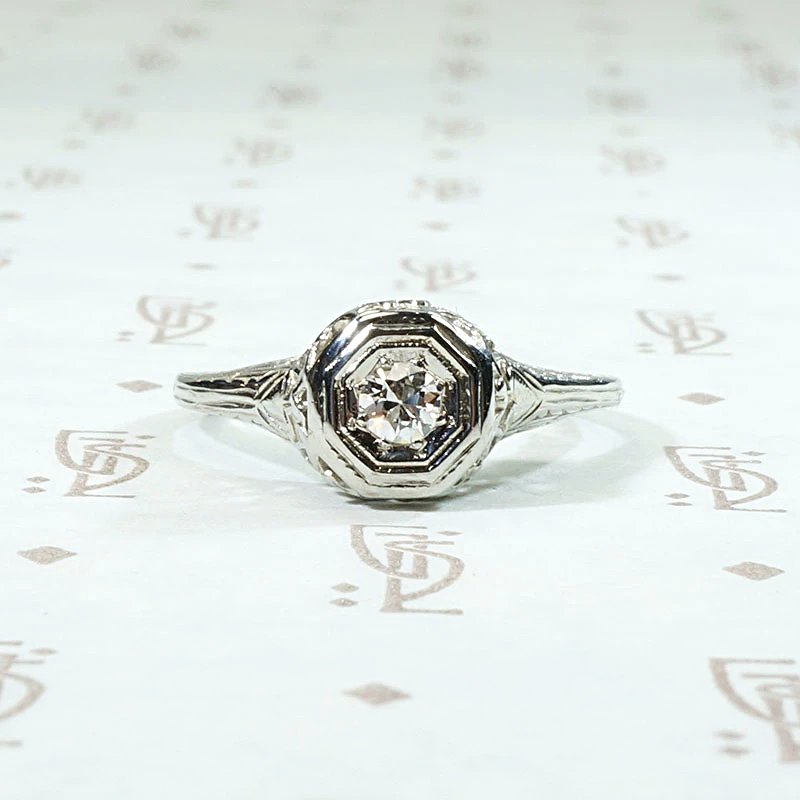 Diamond Solitaire Engagement Ring with Filigreed Hearts 