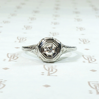 Diamond Solitaire Engagement Ring with Filigreed Hearts 