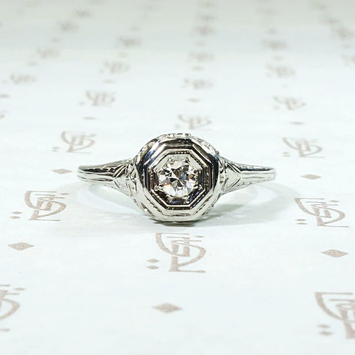 Diamond Solitaire Engagement Ring with Filigreed Hearts 