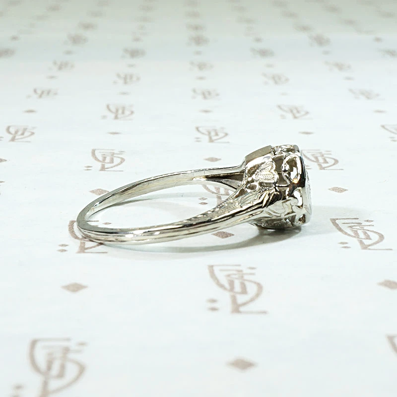 Diamond Solitaire Engagement Ring with Filigreed Hearts 