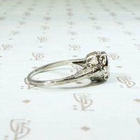 Diamond Solitaire Engagement Ring with Filigreed Hearts 
