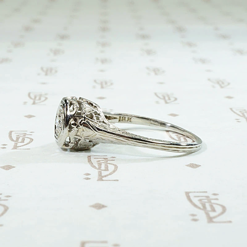 Diamond Solitaire Engagement Ring with Filigreed Hearts 