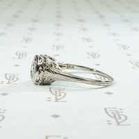 Diamond Solitaire Engagement Ring with Filigreed Hearts 
