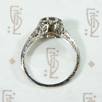 Diamond Solitaire Engagement Ring with Filigreed Hearts 