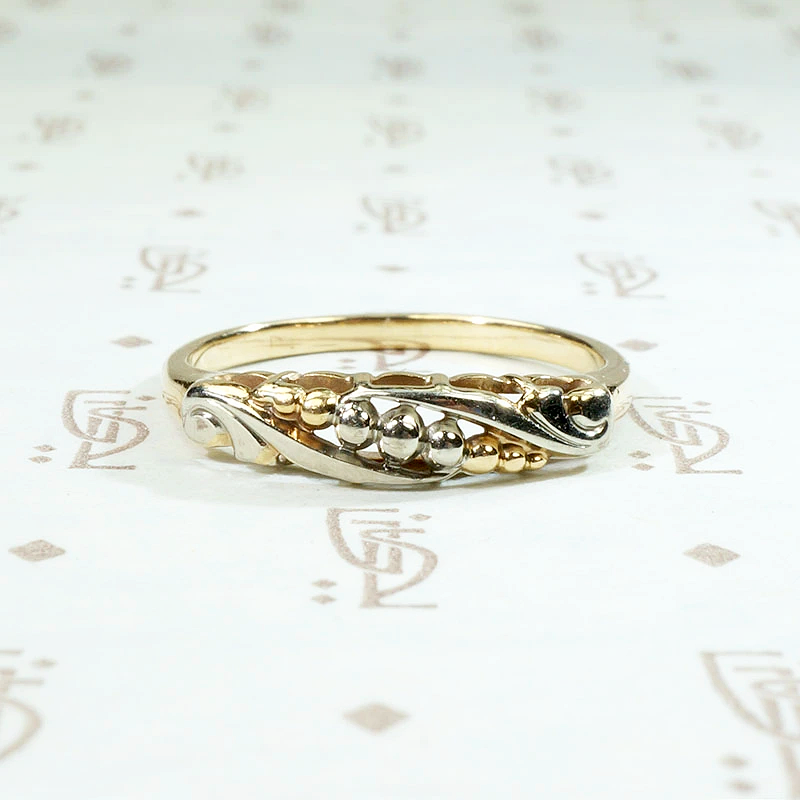 Beautifully Sculpted Two Tone Asymmetric Wedding Band
