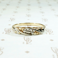 Beautifully Sculpted Two Tone Asymmetric Wedding Band