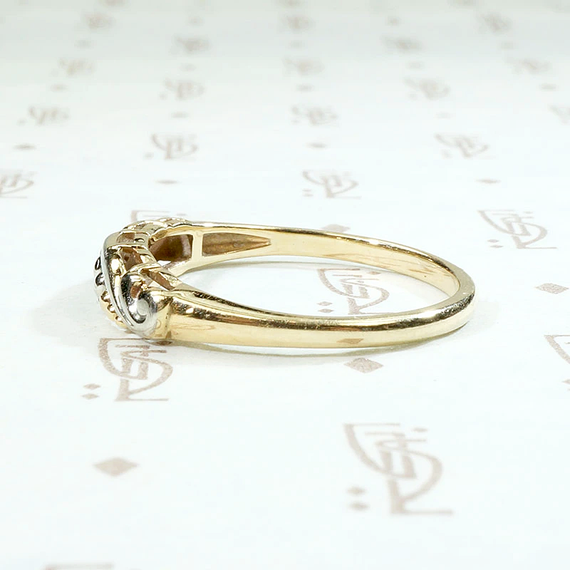 Beautifully Sculpted Two Tone Asymmetric Wedding Band