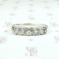 Pretty Five Diamond Wedding Band with Knife Edge Detail