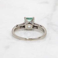 Timeless Emerald Ring with Baguette Accents