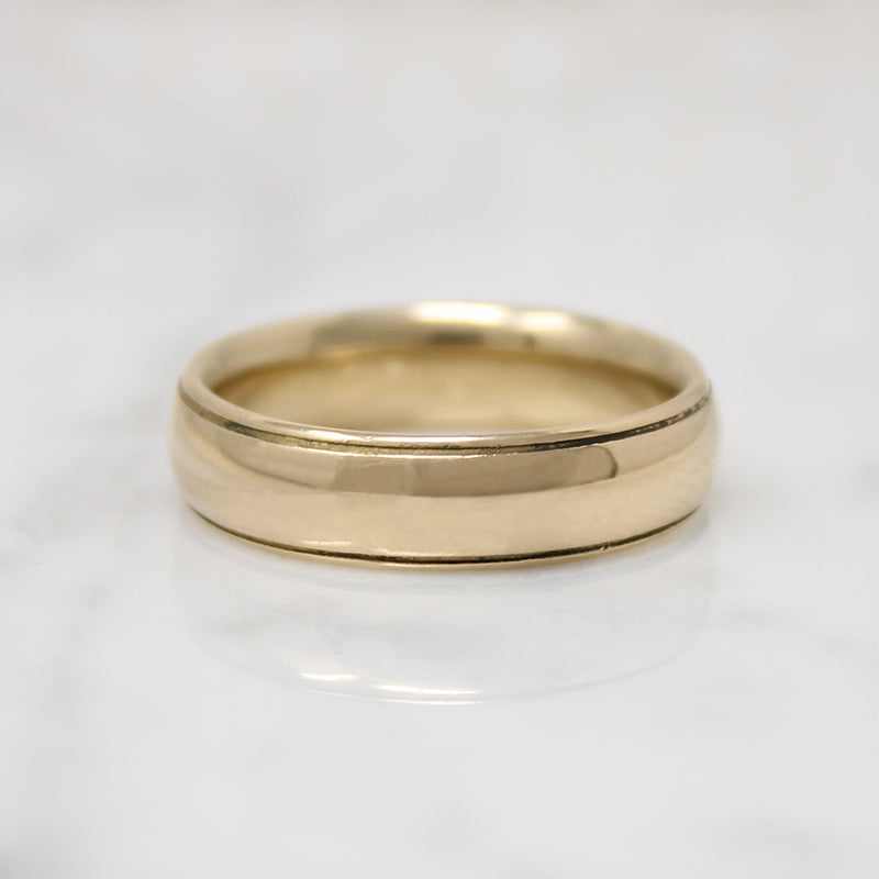Substantial Gold Wedding Band with Stepped Edges