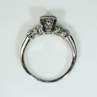 Romantic White Gold Engagement Ring with Floral Details