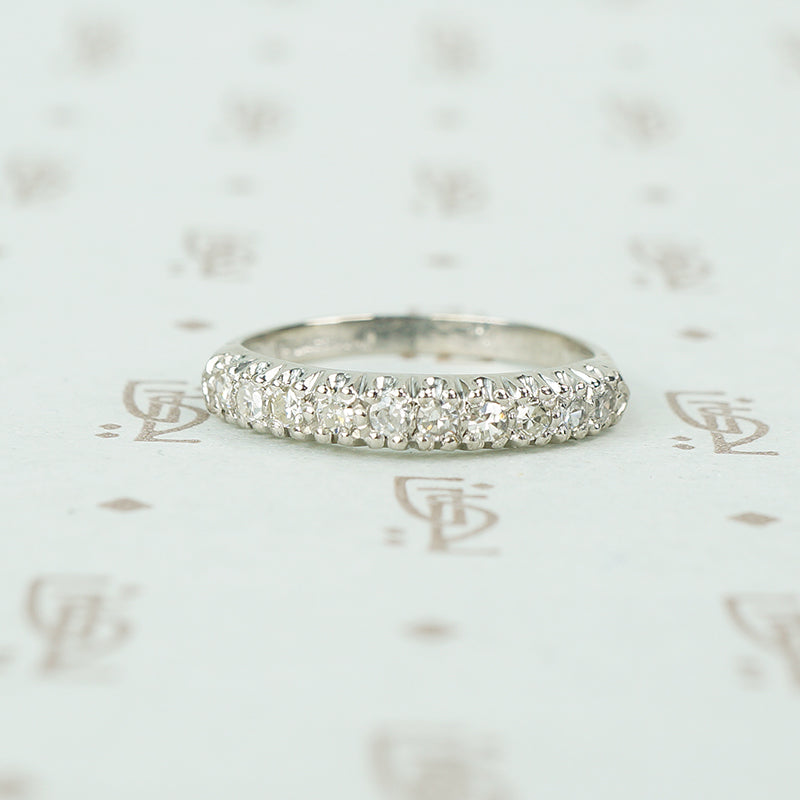 1940's 10 diamond wedding band in platinum with knife edge band