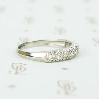 1940's 10 diamond wedding band in platinum with knife edge band side view of detail
