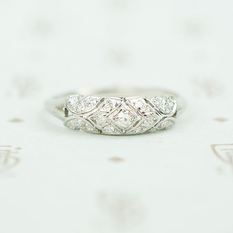 edwardian open work platinum millgrain edged diamond band ring