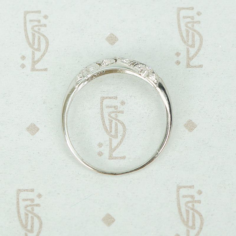 flat side view of edwardiand band ring shouwing slightly puffed top