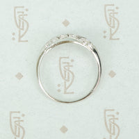 flat side view of edwardiand band ring shouwing slightly puffed top