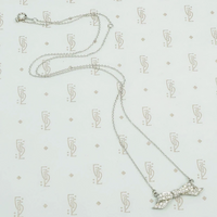 Pavé diamond platinum bow necklace