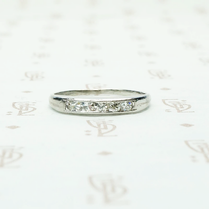 5 diamond channel set platinum wedding band