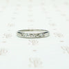 5 diamond channel set platinum wedding band