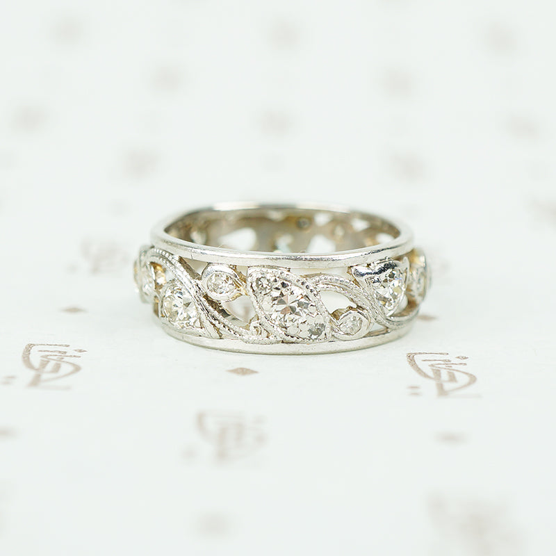 platinum open work wide eternity band vine and bud diamond set design 1920's