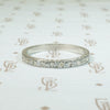 engraved platinum and 6 diamond band forget me not flowers are engraved all the way round