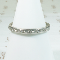 Arrows and Flowers a Platinum Deco Diamond Band