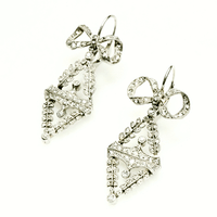 Edwardian Bow and Garland Pave set Rose Cut Diamond Earrings in Platinum