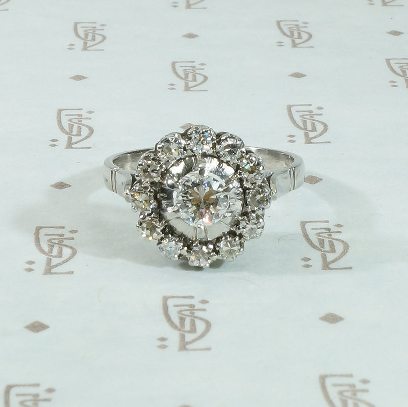 Vintage Platinum Halo Diamond Ring