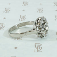 Vintage Platinum Halo Diamond Ring