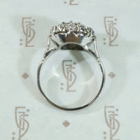 Vintage Platinum Halo Diamond Ring
