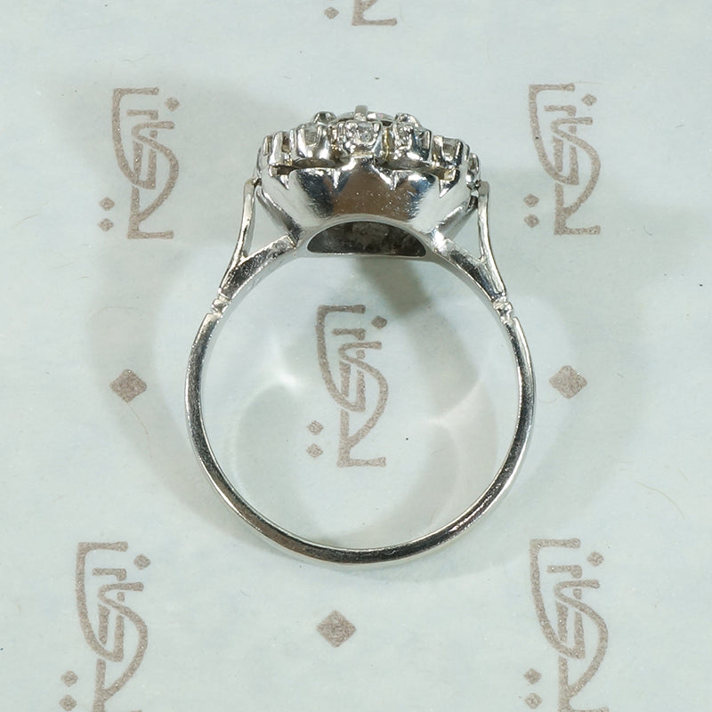 Vintage Platinum Halo Diamond Ring
