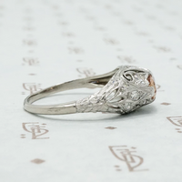 edwardian platinum filigree diamond ring with imperial topaz