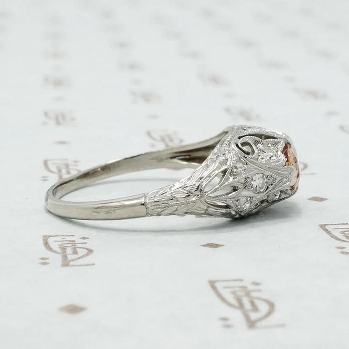 edwardian platinum filigree diamond ring with imperial topaz
