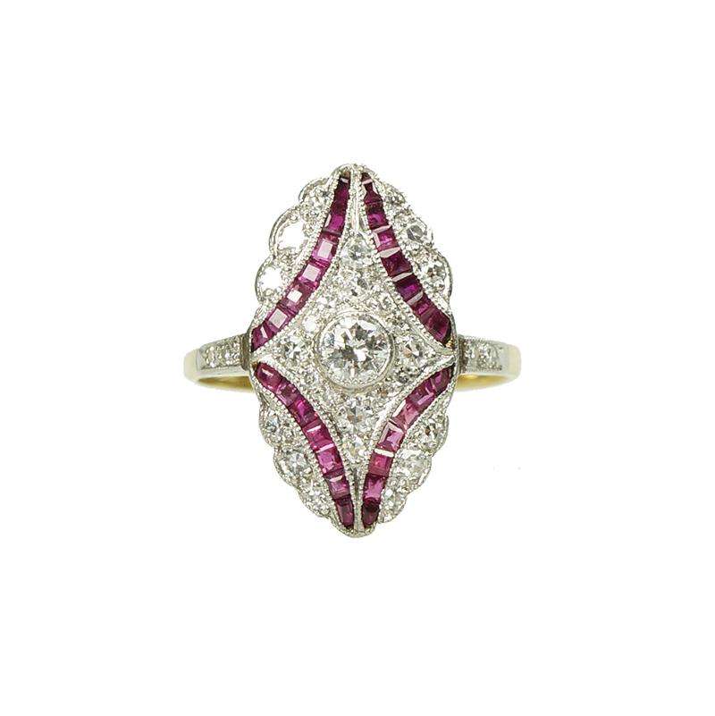 Platinum and 18k Yellow Gold Calibre Ruby and Diamond Ring