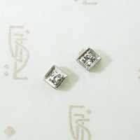 saw tooth edge engraved art deco platinum diamond stud earrings repourposed from a bracelet