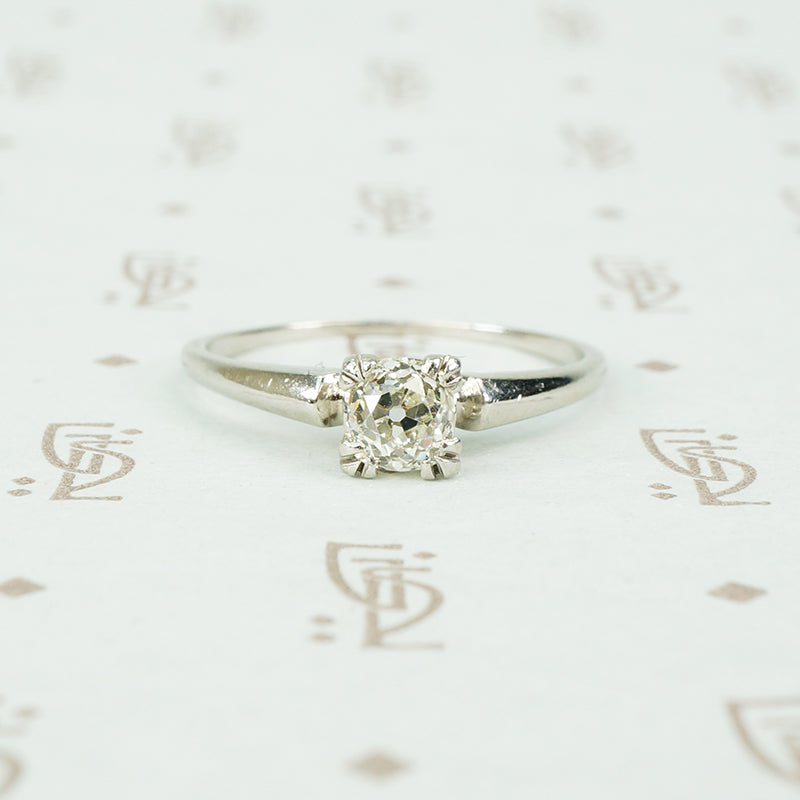 1/2 carat old mine cut diamond in platinum solitaire engagement ring