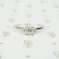 1/2 carat old mine cut diamond in platinum solitaire engagement ring