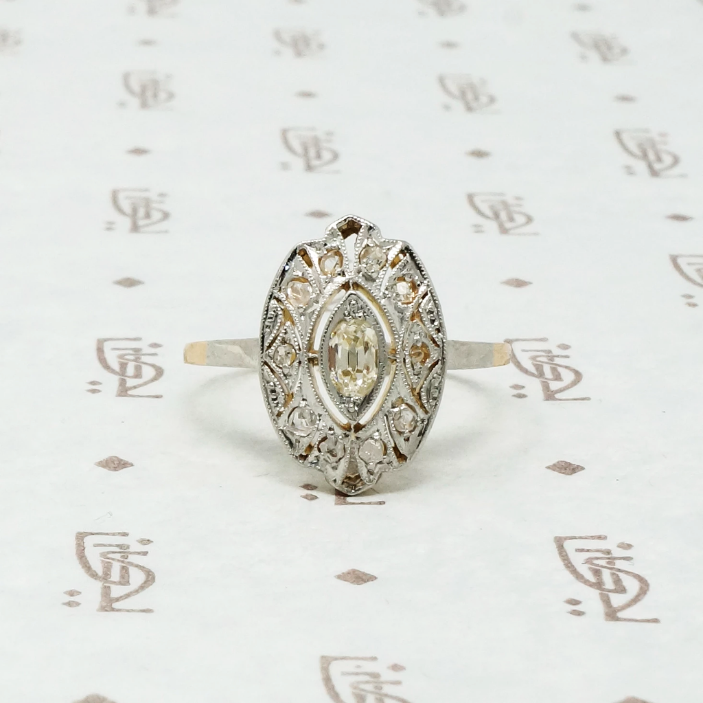 plat on 18k tablet cut omc diamond ring