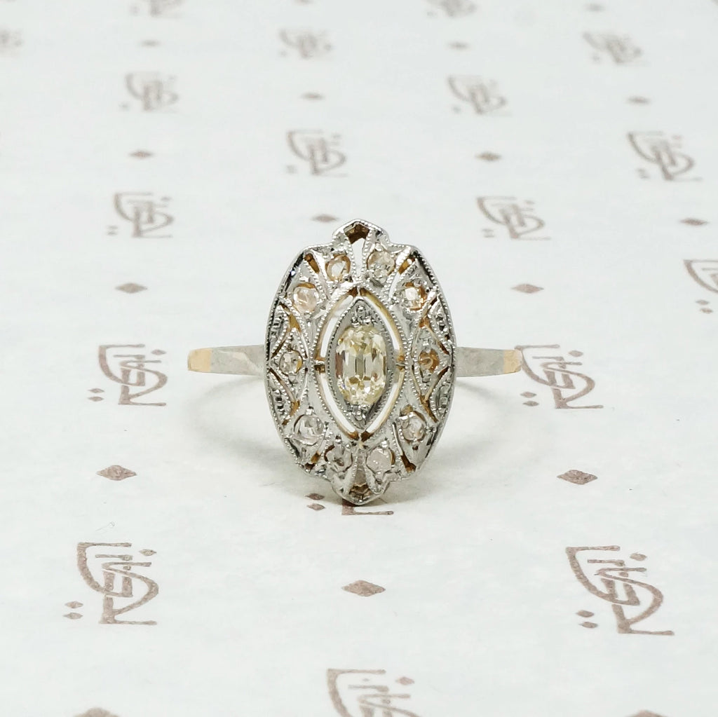 plat on 18k tablet cut omc diamond ring