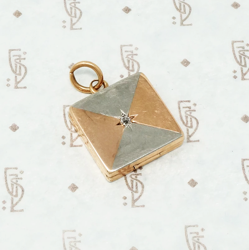 platinum rose gold and diamond locket