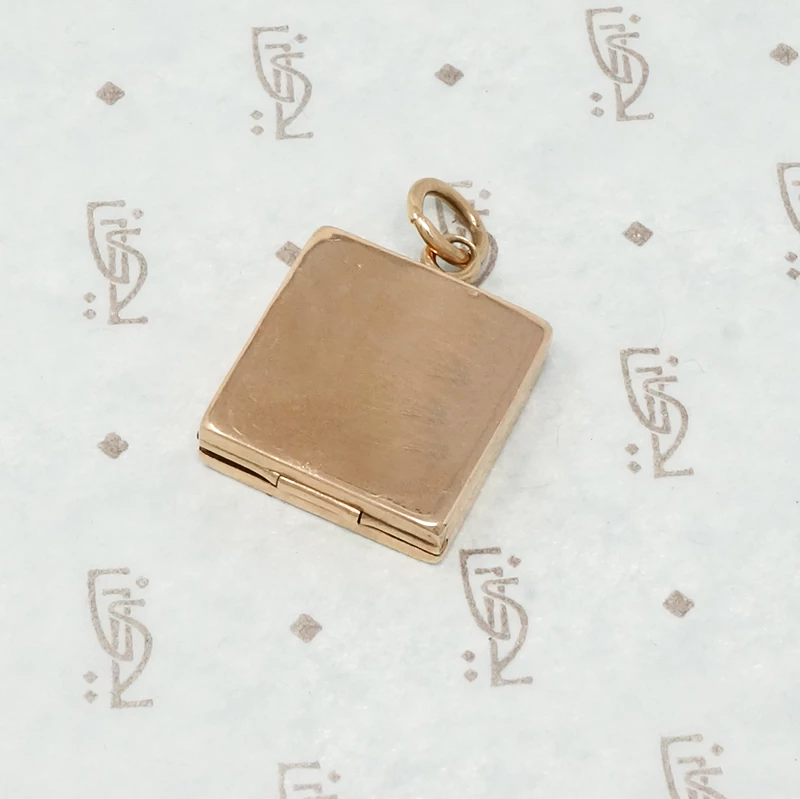 platinum rose gold and diamond locket back