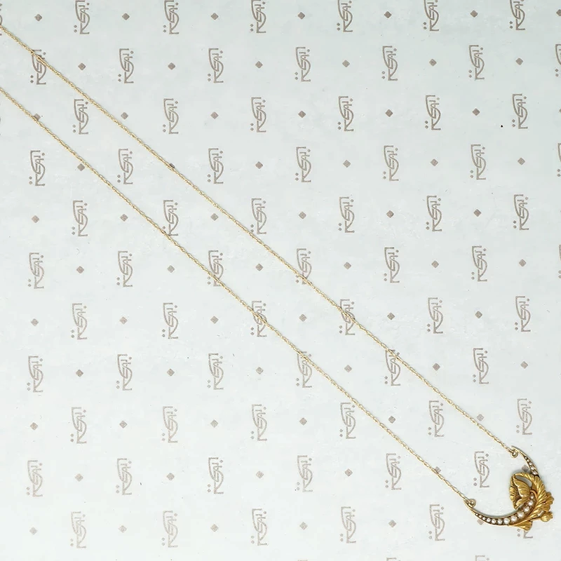 gold vintage crescent moon and poppy necklace