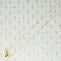 gold vintage crescent moon and poppy necklace back view