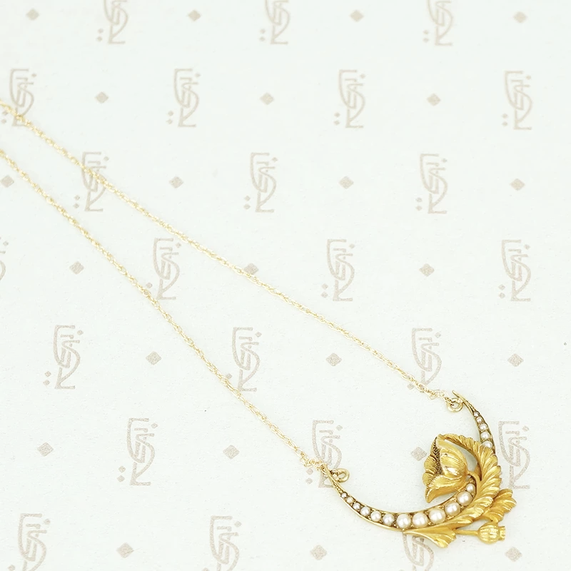 gold vintage crescent moon and poppy necklace