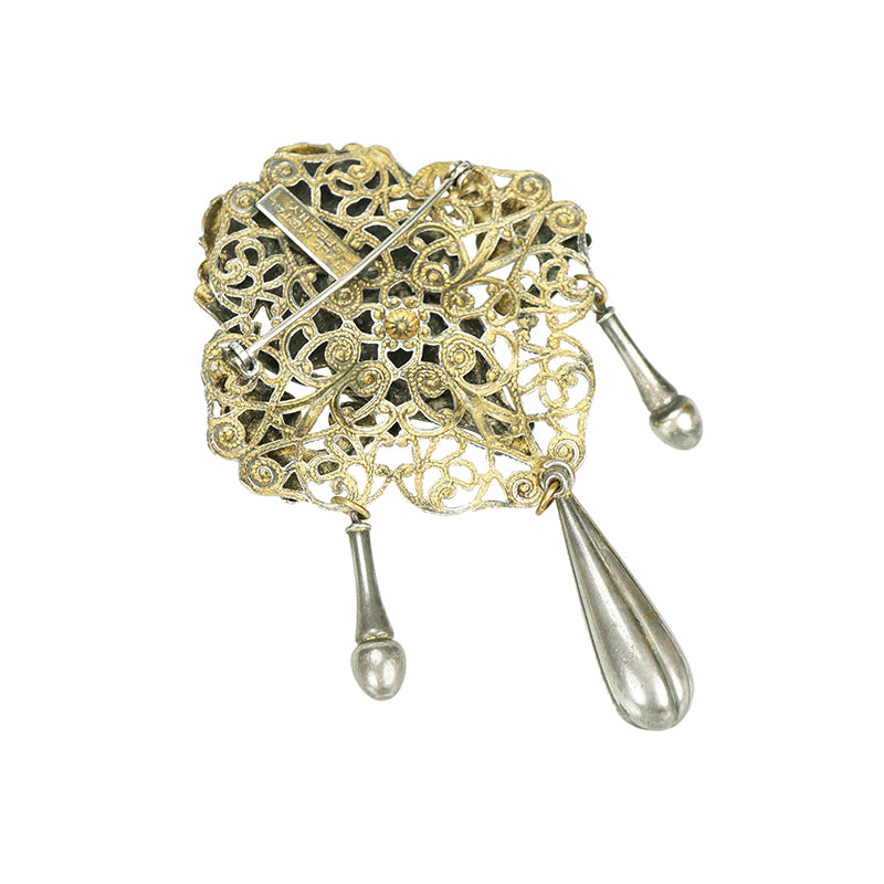 Style Metal Spec. NY. Brooch with cherubs