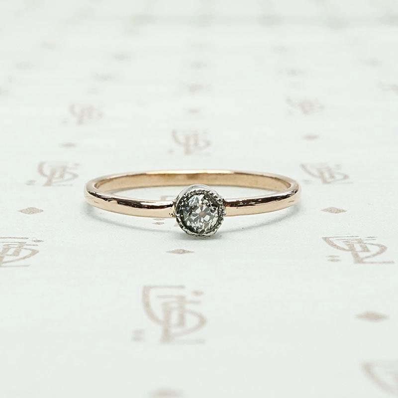Orbit Delicate Bezel Set Diamond Solitaire