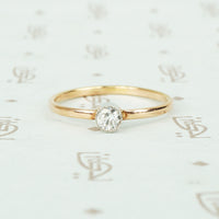 recycled rose gold and bezel platinum tiny diamond engagement ring