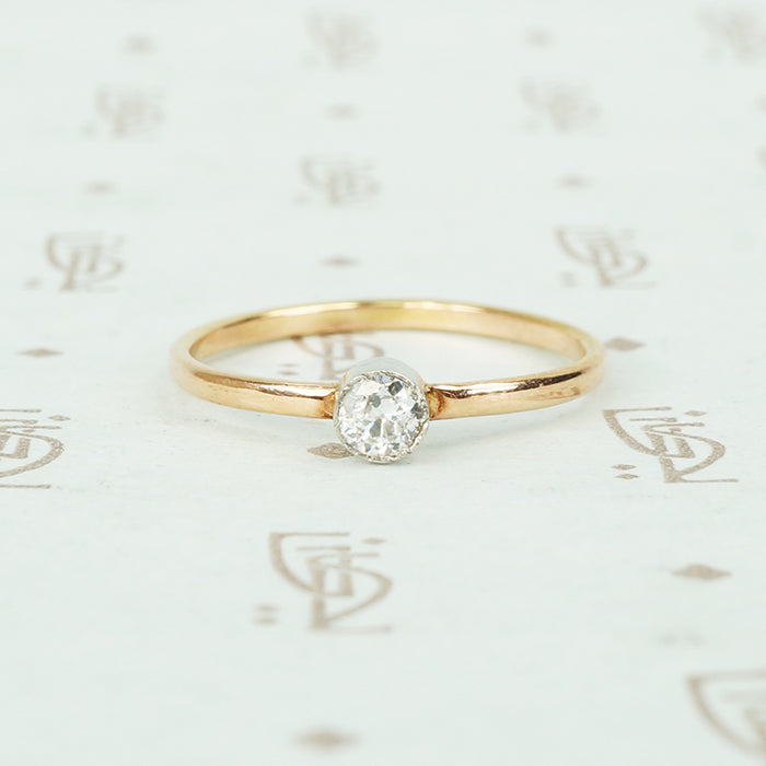 recycled rose gold and bezel platinum tiny diamond engagement ring