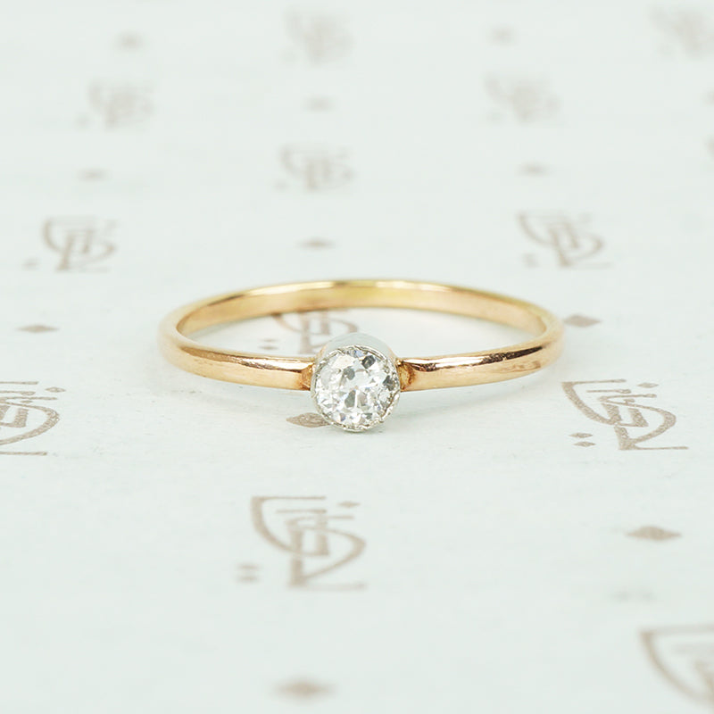 recycled rose gold and bezel platinum tiny diamond engagement ring