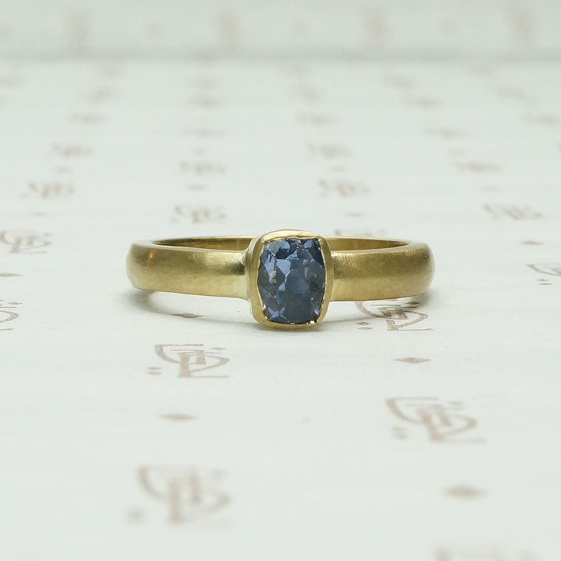 Dramatic Minimalism Cushion Cut Sapphire SolitaireDramatic Minimalism Cushion Cut Sapphire Solitaire